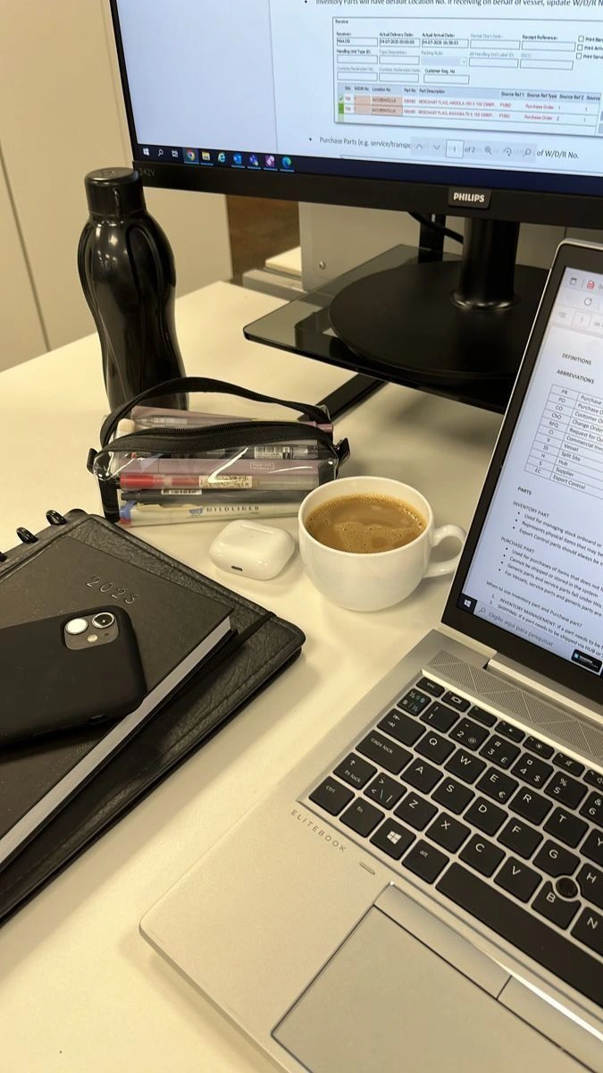 Workspace of the Best Digital Marketer in Saudi Arabia with laptop, planner, and coffee